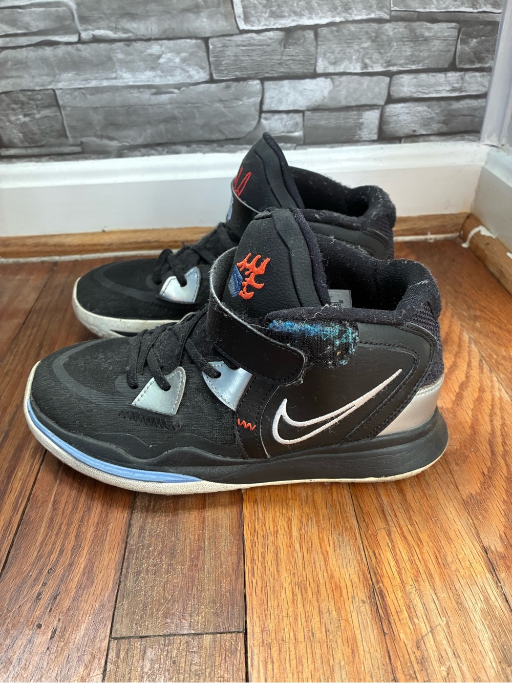 Nike Kids Black and Silver High-Top Sneakers with Blue Trim